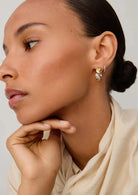 Molton Snow Twisted Small Hoop (8435488161989)